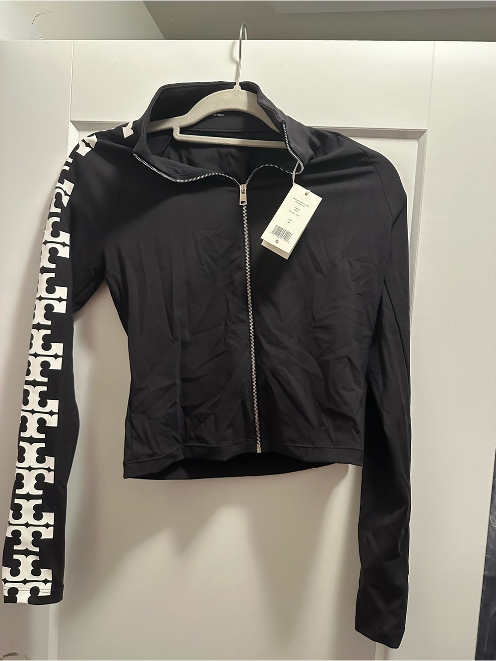 Tory Burch Black Zip-Front Jacket with White Logo Sleeve